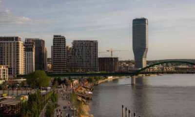 a view of a body of water with a bridge in the background