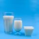 Three types of milk glasses on a blue backdrop, illustrating variety.