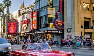 red convertible car on road during daytime