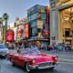red convertible car on road during daytime
