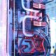 Close-up view of a custom gaming PC with water cooling and LED lights, highlighting advanced technology.