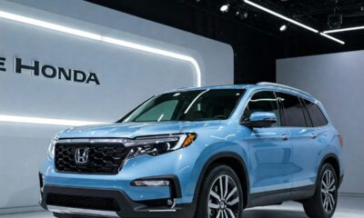 The 2025 Honda Pilot showcased at an auto exhibition, highlighting its modern design.