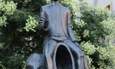 a statue of a person riding a horse