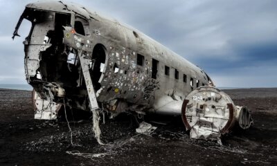 a plane that is sitting in the dirt