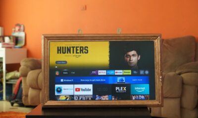 a picture of a man's face on the screen of a television