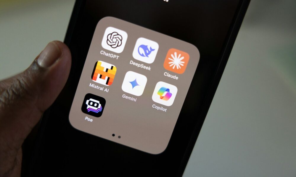 A person holding a smart phone in their hand