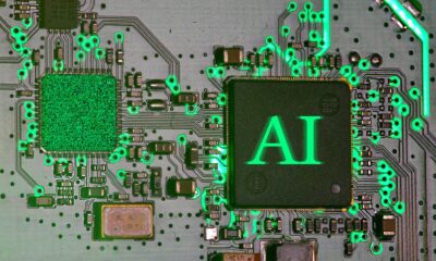 Glowing ai chip on a circuit board.