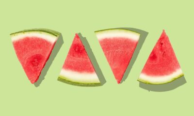 sliced watermelon with green background