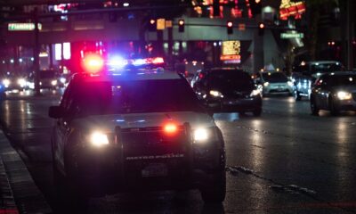 black car on road during night time