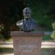 A bronze bust of Josip Broz Tito on a stone pedestal in Gradačac, Bosnia and Herzegovina.