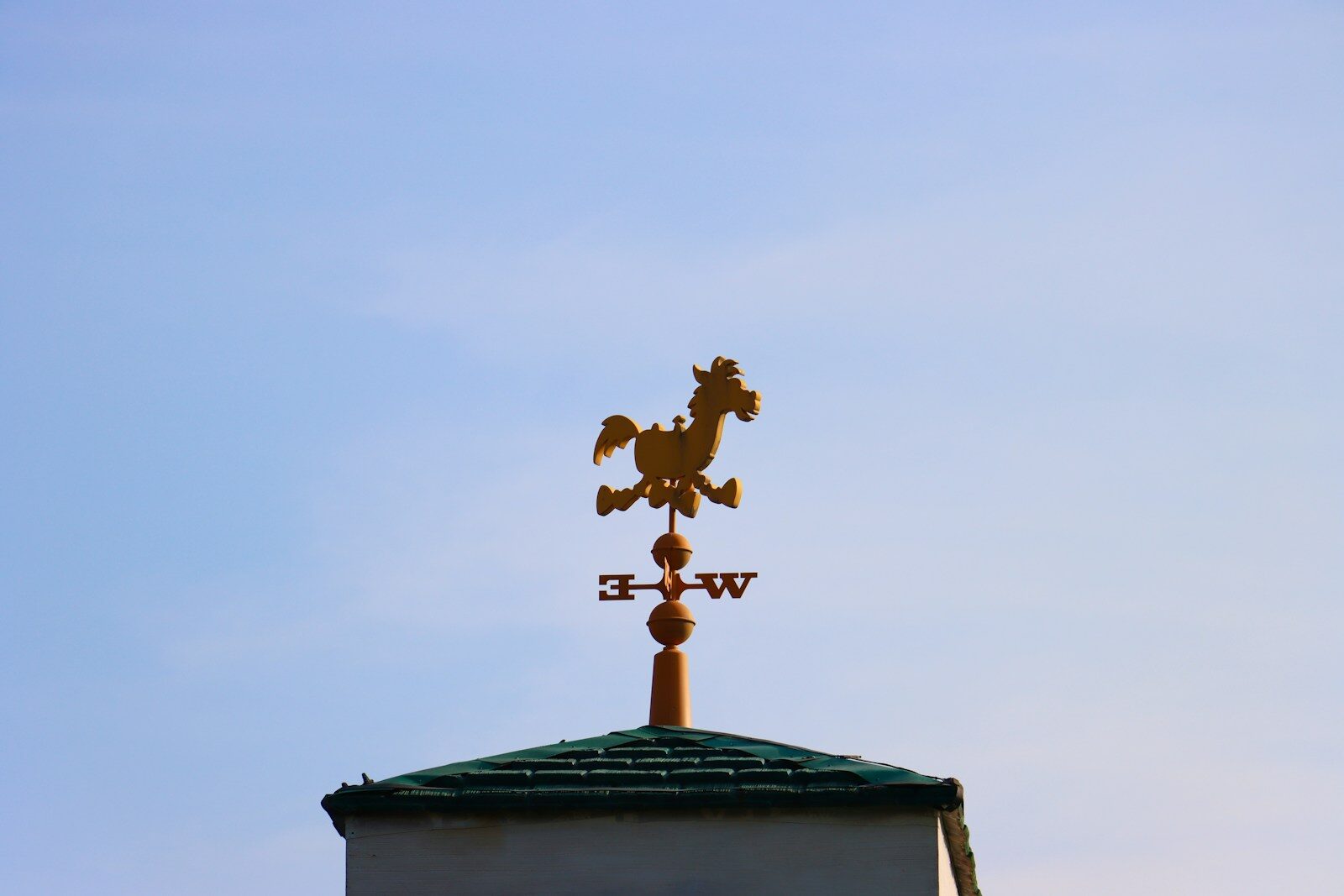 a cross on top of a building