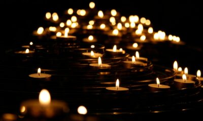 low-angle photo of lightened candles