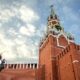 View of the Spasskaya Tower of the Moscow Kremlin against a cloudy sky. Architectural landmark.