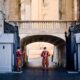 Vatican Swiss Guards stand at the entrance, showcasing traditional uniforms in Vatican City.