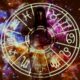 Woman standing with astrological symbols projected, evoking a mystical vibe.