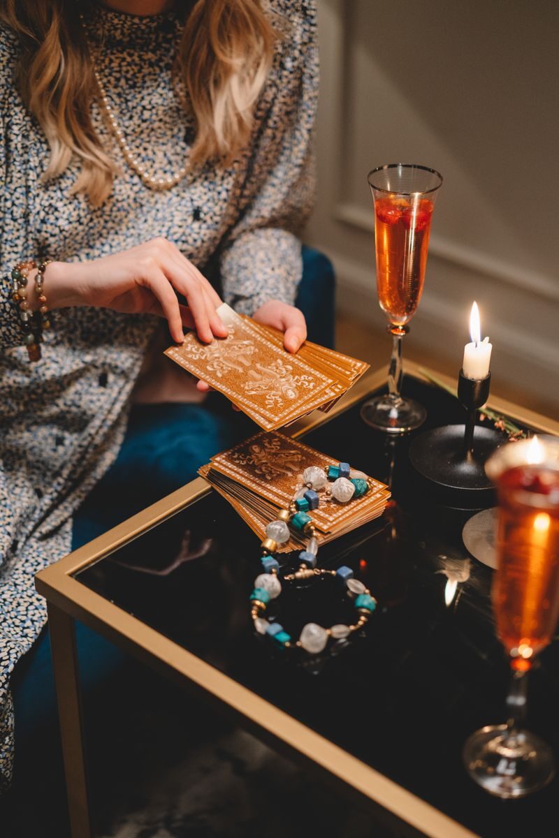 A serene tarot reading setup with elegant lighting and champagne, adding a mystical ambiance.