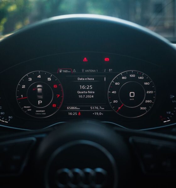 Dynamic shot of a modern car dashboard featuring a digital display and sleek design.