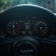 Dynamic shot of a modern car dashboard featuring a digital display and sleek design.