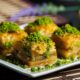 Enjoy a mouthwatering close-up of authentic baklava topped with vibrant pistachios. Perfect for food lovers.