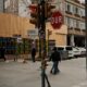 City intersection in Turkey with stop sign, pedestrians, and buildings
