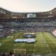 Captivating view of a soccer match at Munich's iconic Allianz Arena, filled with excited fans.
