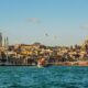 city buildings near body of water during daytime