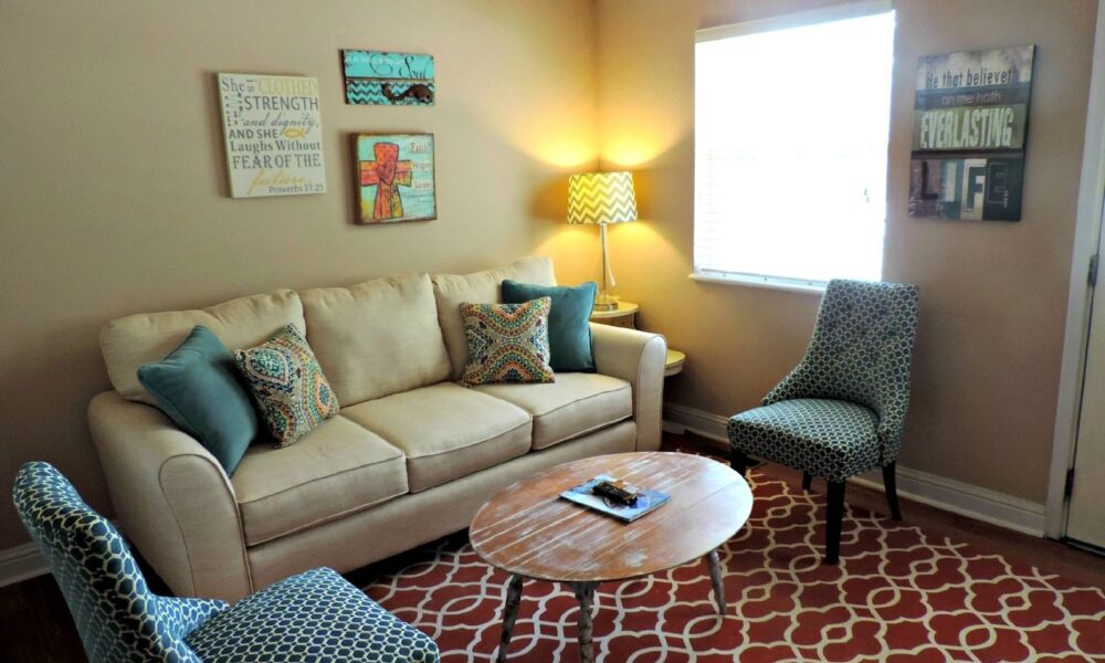 Bright living room with elegant furniture and modern decor, perfect for relaxation.