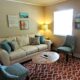 Bright living room with elegant furniture and modern decor, perfect for relaxation.