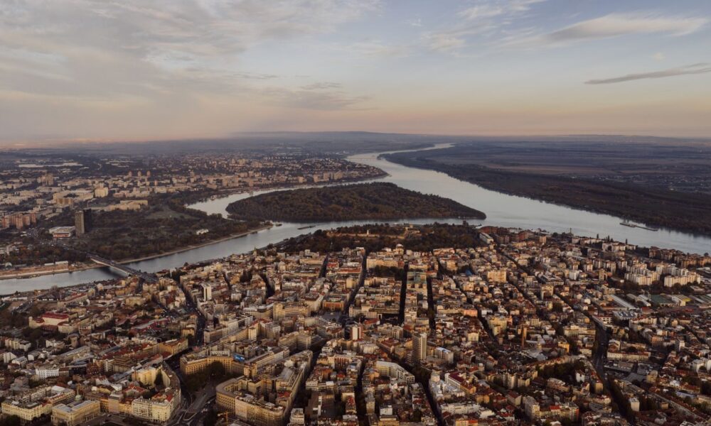 Breathtaking aerial view of Belgrade, Serbia with the Danube River winding through the city.