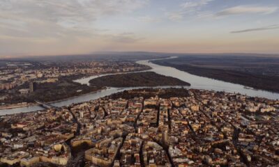 Breathtaking aerial view of Belgrade, Serbia with the Danube River winding through the city.