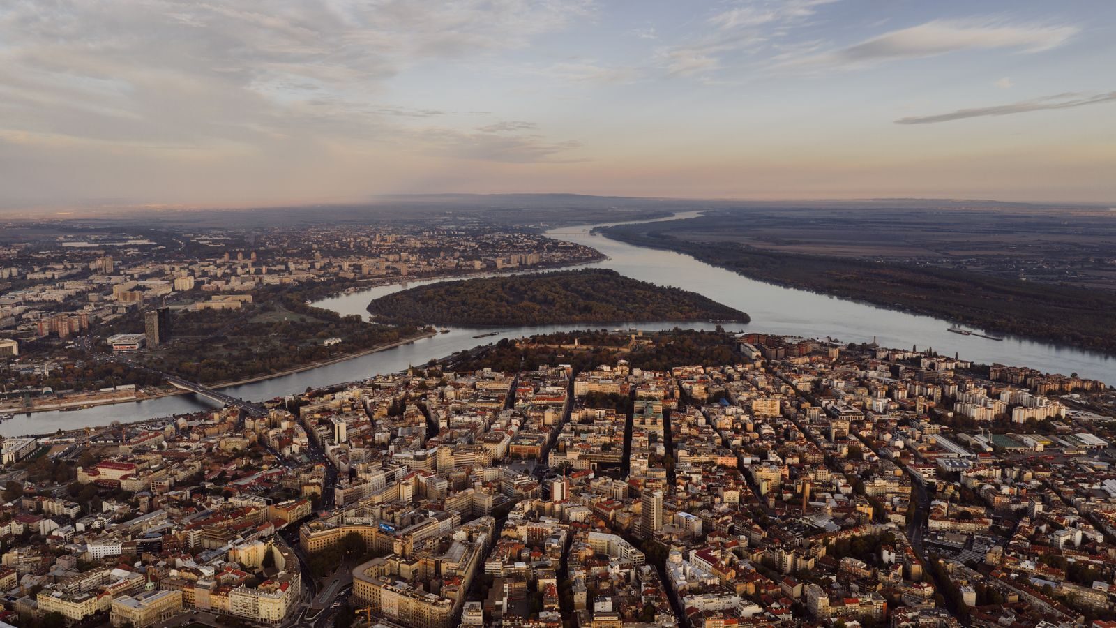 Breathtaking aerial view of Belgrade, Serbia with the Danube River winding through the city.