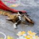 A set of keys lying on a floral-patterned fabric background. Ideal for security themes.