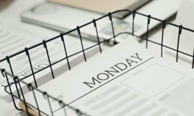 Top view of a Monday planner in an office setting, ideal for organizing schedules.
