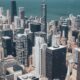 Stunning aerial view of Chicago's skyline showcasing modern skyscrapers against Lake Michigan.