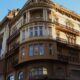 A stunning Neo-Renaissance building in Belgrade showcasing intricate architectural details under clear skies.