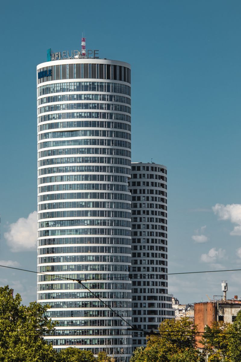 Explore contemporary architecture with Belgrade's towering skyscrapers under a clear blue sky.