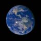 A breathtaking view of planet Earth showing continents and oceans against a dark backdrop.