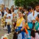 Colorful celebration in Oaxaca, showcasing traditional clothing and joyful participants.