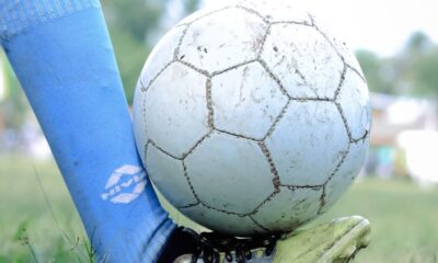 Close-up of a soccer player controlling the ball during a game in Kuttanad.