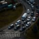 Rush hour traffic captured from above at a busy intersection in Cluj-Napoca, Romania.