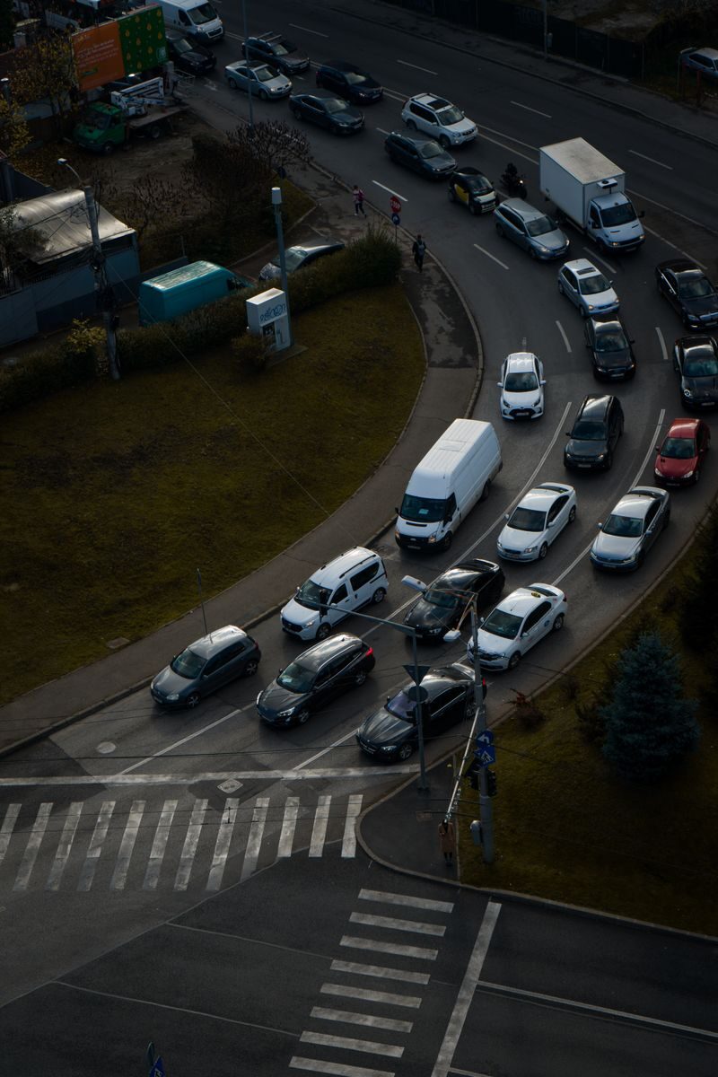 Rush hour traffic captured from above at a busy intersection in Cluj-Napoca, Romania.