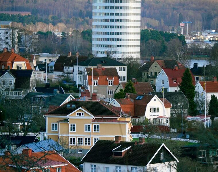 Charming architecture and scenic landscape of Jönköping, Sweden with a modern high-rise building.