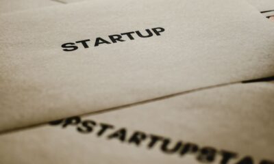 Close-up of envelopes with 'STARTUP' text, symbolizing business initiation.