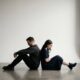 silhouette, back-to-back, despondent, depressed, lawyer, divorce, struggle, legal, downcast, cool light, contrast, separation, relationship issues, problem, difficult, burden, conflict, emotion, reflection, solitude, ai generated