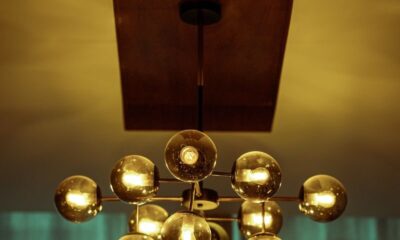 Elegant modern chandelier with warm lighting creating an inviting atmosphere indoors.