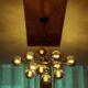 Elegant modern chandelier with warm lighting creating an inviting atmosphere indoors.