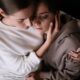 Two women embracing supportively, reflecting emotional bonding and comfort in difficult times.