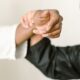 Detailed view of martial arts wrist lock demonstrating a defensive technique.