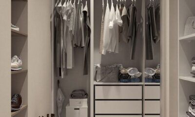 Stylish walk-in closet with neutral tones and contemporary design elements.