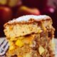Scrumptious slice of apple cake dusted with powdered sugar, perfect for dessert lovers.